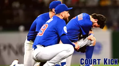 Spectator Falls from Outfield Wall During Pirates-Cubs Game